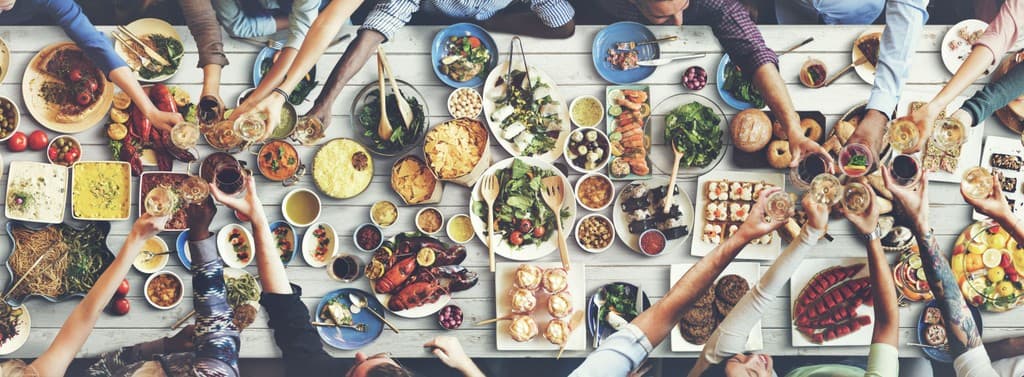 A table filled with culturally diverse foods and ingredients.